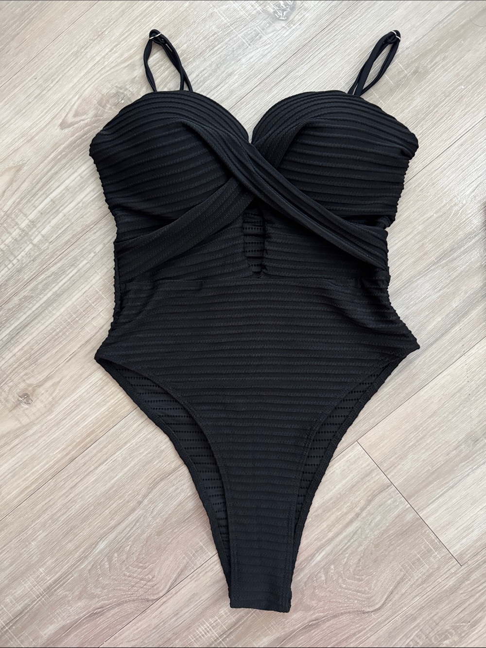 NWOT Black One-Piece Swimsuit with Twist Front and high cut leg, S